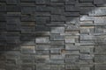 Sunlight and shadow on surface of  gray stone slate wall background Royalty Free Stock Photo