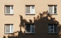Sunlight and Shadows on Tan Brick Building Facade Royalty Free Stock Photo
