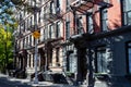 Sunlight shines on a block of historic buildings on Leroy Street in the West Village neighborhood of New York City Royalty Free Stock Photo