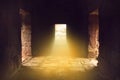 Sunlight shines through the door in the end of ancient stone temple Royalty Free Stock Photo