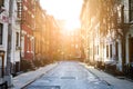 Sunlight shines on historic buildings along Gay Street in New York City Royalty Free Stock Photo