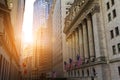 Sunlight shines on the historic buildings of the financial district in lower Manhattan, New York City near Wall Street Royalty Free Stock Photo