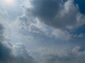 The sunlight shines through the large clouds. Royalty Free Stock Photo