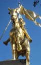 Sunlight Shining on a Gold Joan of Arc Statue Royalty Free Stock Photo