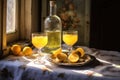 sunlight shining through limoncello-filled glasses on a table