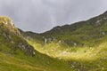 Sunlight on the steep sides of Corrie Fee, a Glacial Corrie in the heart of the Angus Glens.