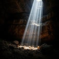 Sunlight streaming through cave opening Royalty Free Stock Photo