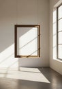 Sunlight streaming through an open window casting geometric shadows on a minimalist room floor and walls Royalty Free Stock Photo