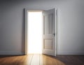 Sunlight Streaming Through a Slightly Opened Door in a Tranquil Room Royalty Free Stock Photo