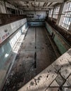 Derelict Swimming Pool in an Abandoned Building Royalty Free Stock Photo