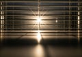 Partially open horizontal blinds, casting parallel shadows and illuminati Royalty Free Stock Photo