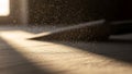 Sunlight streams through a window, casting a warm glow on floating dust partic Royalty Free Stock Photo