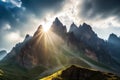 sunlight striking jagged peaks of a mountain