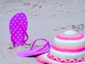 Sunlight Summer composition. Beach flip flops on tropical ocean sand. against blue sea and sky background. Beach Accessories Royalty Free Stock Photo