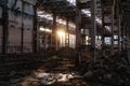 Sunlight of sunset in large abandoned industrial building of Voronezh excavator factory