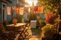 sunlit backyard with clothesline full of drying clothing Royalty Free Stock Photo