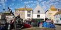 Sunlit Buildings and Fishing Gear in Cornish Fishing Village