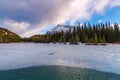 Sunlit Clouds Over A Frozen Mountain Lake Royalty Free Stock Photo