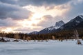 Sunlit Clouds Over Snowy Canmore Mountains Royalty Free Stock Photo