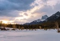 Sunlit Clouds Over Snowy Canmore Mountains Royalty Free Stock Photo