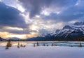 Sunrise Clouds Over Snowy Mountains And Lake Royalty Free Stock Photo