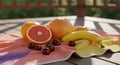 Sunlit Colorful Fruit Arrangement on a Deck Royalty Free Stock Photo