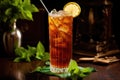 sunlit glass pitcher filled with ice tea and lemon slices