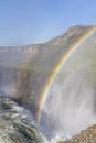 Sunlit Gullfoss waterfall in Iceland with a beautiful double rai Royalty Free Stock Photo