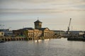 Sunlit harbor scenes in Leith autumn light at the old dock Royalty Free Stock Photo