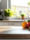 Sunlit kitchen counter with fresh vegetables: peppers and tomatoes in bright morning light Royalty Free Stock Photo