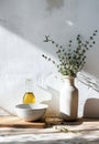 Sunlit Kitchen Counter With Olive Oil, Fresh Herbs, and Cooking Utensils in the Morning Royalty Free Stock Photo