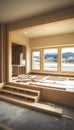 Sunlit Living Room Under Construction with Framing, Subflooring, Large Windows, and Scenic Views Royalty Free Stock Photo