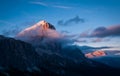 Sunlit mountain tops in chilly atmosphere in Dolomites Royalty Free Stock Photo