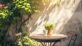 Sunlit patio of a charming cafe with green plants and cobbled flooring inviting a peaceful coffee break.