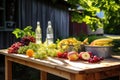 sunlit picnic table with infused vodka bottles and fresh fruits