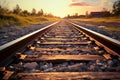 Sunlit railway track with ballast gravel, a scenic railroad landscape