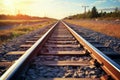Sunlit railway track with ballast gravel, a scenic railroad landscape
