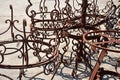 Sunlit Rusty Wrought Iron Tables.