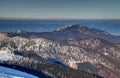 Sunlit snowy ridges and craggy peaks of Velka Fatra Slovakia