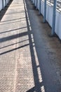 Sunlit Steel Plate Walkway Industrial Overpass Serenity