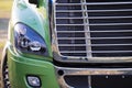 Light Green pro big rig semi truck chromy grille and headlight Royalty Free Stock Photo