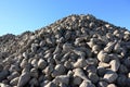 Sunlit sugar beet pile at the field after harvest Royalty Free Stock Photo