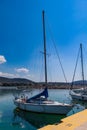 Sunlit White Mediterranean Sailing Boat on Water in Euboea - Nea Artaki, Greece