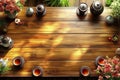 Sunlit wooden table with teaware and flowers arranged for a cozy tea time Royalty Free Stock Photo