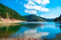 Sunnet Lake, Green and blue water and blue sky, Mountain Forests at the far end, Bolu, Turkey Royalty Free Stock Photo