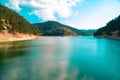 Sunnet Lake, Greenish water and blue cloudy sky, Mountain Forests at the far end, Bolu, Turkey Royalty Free Stock Photo