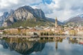 Sunny aerial cityscape of Lecco town on spring day. Picturesque waterfront of Lecco town located between famous Lake Como and