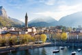 Sunny aerial cityscape of Lecco town on spring morning. Picturesque waterfront of Lecco town located between famous Lake Como and