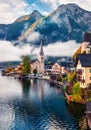 Sunny autumn scene of Hallstatt lake. Splendid morning viev of Hallstatt village, in Austria`s mountainous Salzkammergut region, A