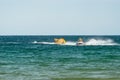 Sunny Beach, Bulgaria July 13, 2019. Inflatable recreational banana boat with people towed by a motorboat in the Black Sea on the